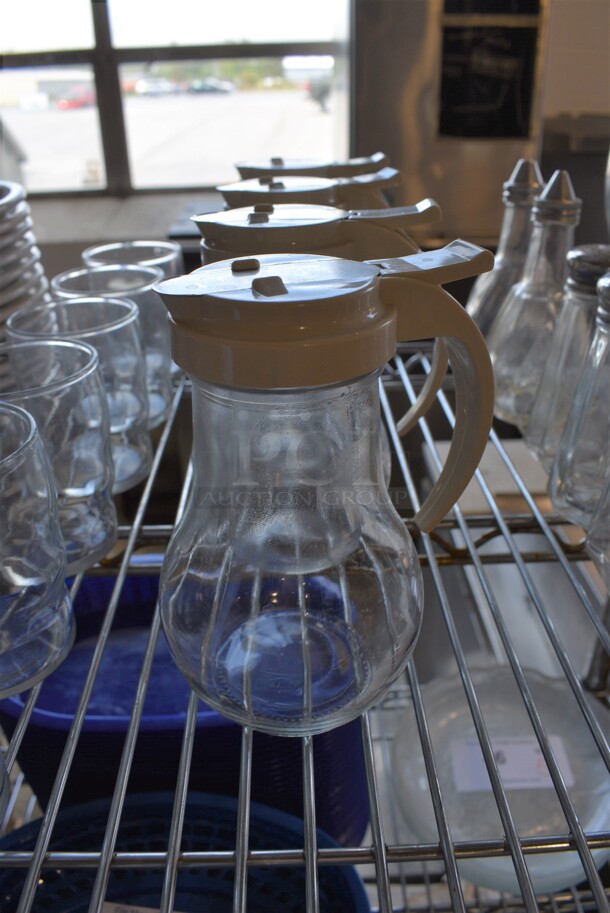 5 Glass Syrup Pourers. 4.5x3.5x6. 5 Times Your Bid!