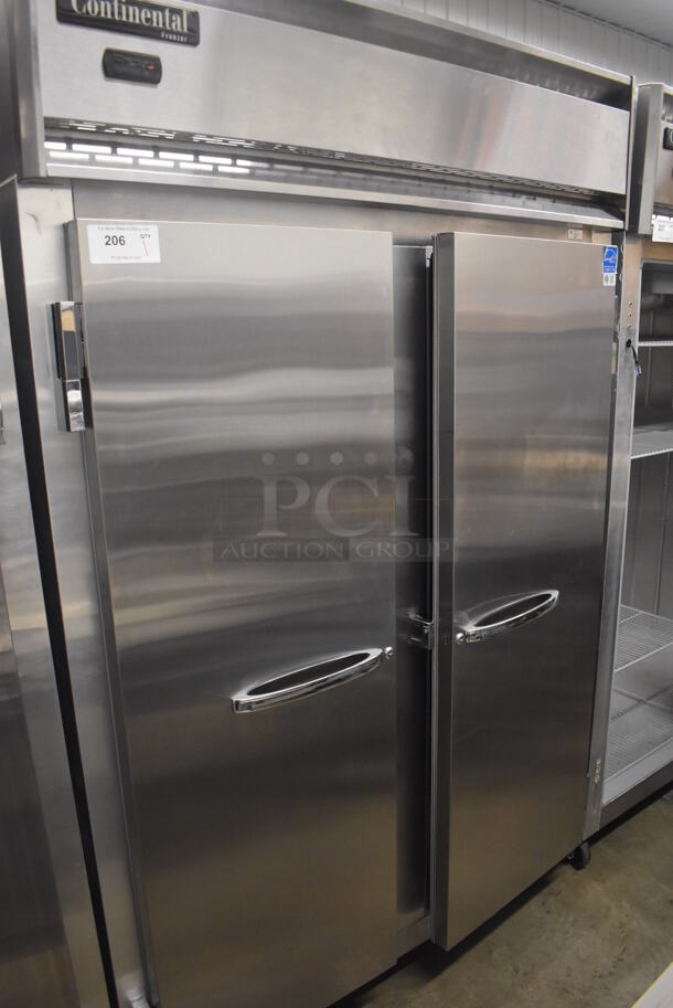 Continental 2FN ENERGY STAR Stainless Steel Commercial 2 Door Reach In Freezer on Commercial Casters. 115 Volts, 1 Phase. 57x34x82. Tested and Does Not Power On