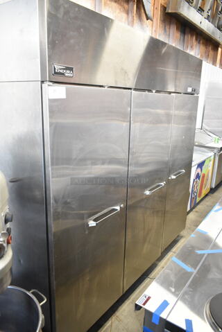 Endura MNF803SSS/0 Stainless Steel Commercial 3 Door Reach In Freezer on Commercial Casters. 115 Volts, 1 Phase. Cannot Test Due To Cut Power Cord