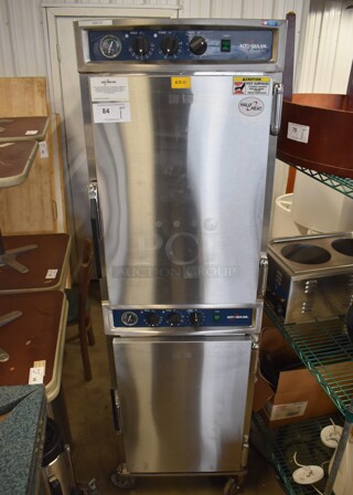 Alto Shaam 1000-TH/I Halo Heat Stainless Steel Commercial 2 Half Size Door Reach In Cook N Hold Cabinet on Commercial Casters. 208-240 Volts, 1 Phase. 22x31x75