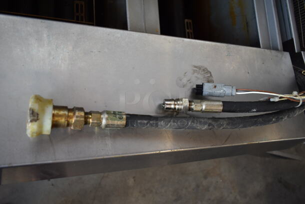 2020 Henny Penny OGA-323 ENERGY STAR Stainless Steel Commercial Natural Gas Powered 3 Bay Fryer w/ 3 Metal Fry Baskets on Commercial Casters. 255,000 BTU.  - Image 11 of 12