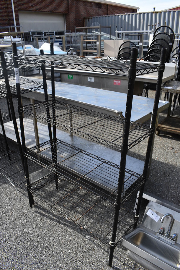 Black Finish 4 Tier Wire Shelving Unit. BUYER MUST DISMANTLE. PCI CANNOT DISMANTLE FOR SHIPPING. PLEASE CONSIDER FREIGHT CHARGES. 35.5x14x55
