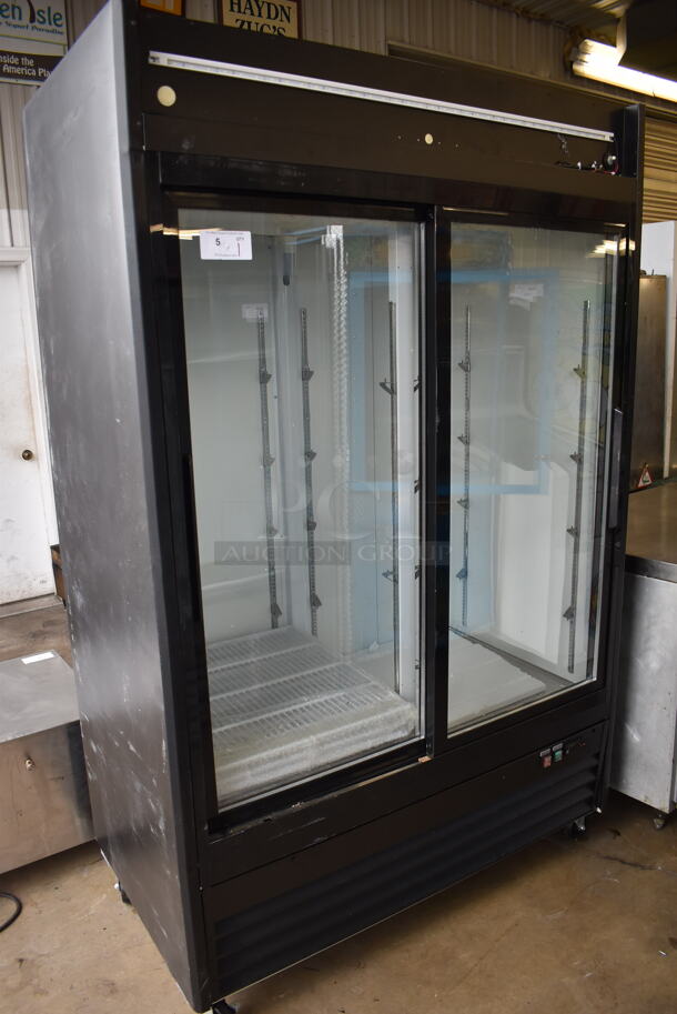 BRAND NEW SCRATCH AND DENT! Avantco 178GDS47HCB Metal Commercial 2 Door Reach In Cooler Merchandiser on Commercial Casters. 52x30x84. Tested and Working!