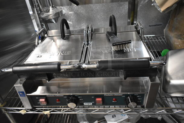 BRAND NEW SCRATCH AND DENT! Waring WFG300 Stainless Steel Commercial Countertop Tostato Ottimo Smooth Top & Bottom Dual Panini Press Sandwich Grill - 17" x 9 1/4" Cooking Surface. 240 Volts, 1 Phase.  - Image 2 of 6