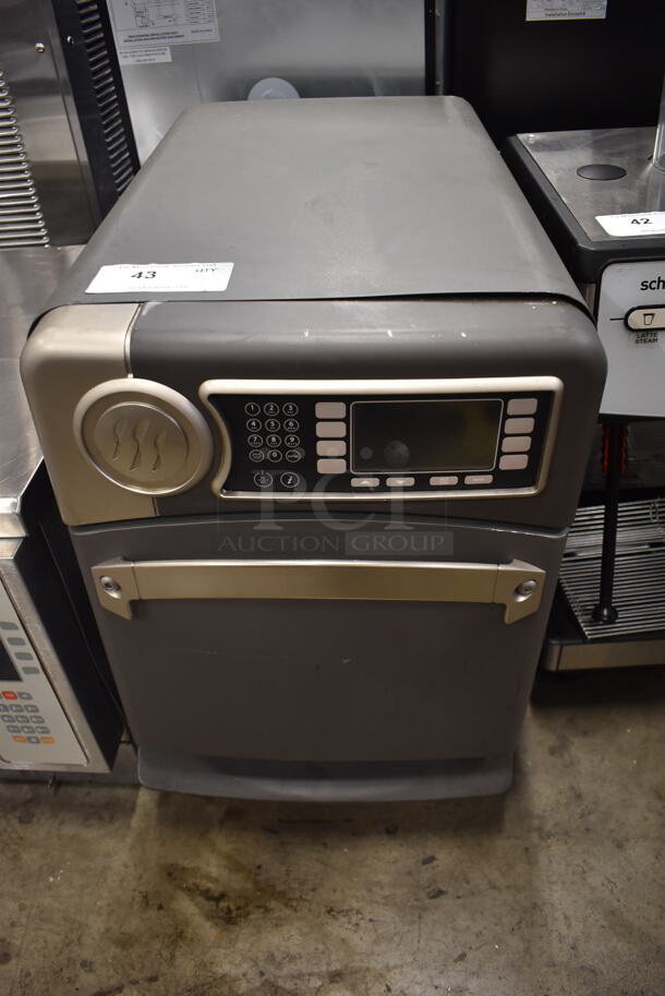 2016 Turbochef NGO Commercial Stainless Steel Countertop Rapid Cook Oven With Steel Racks. 208/240V, 1 Phase.  - Image 1 of 5