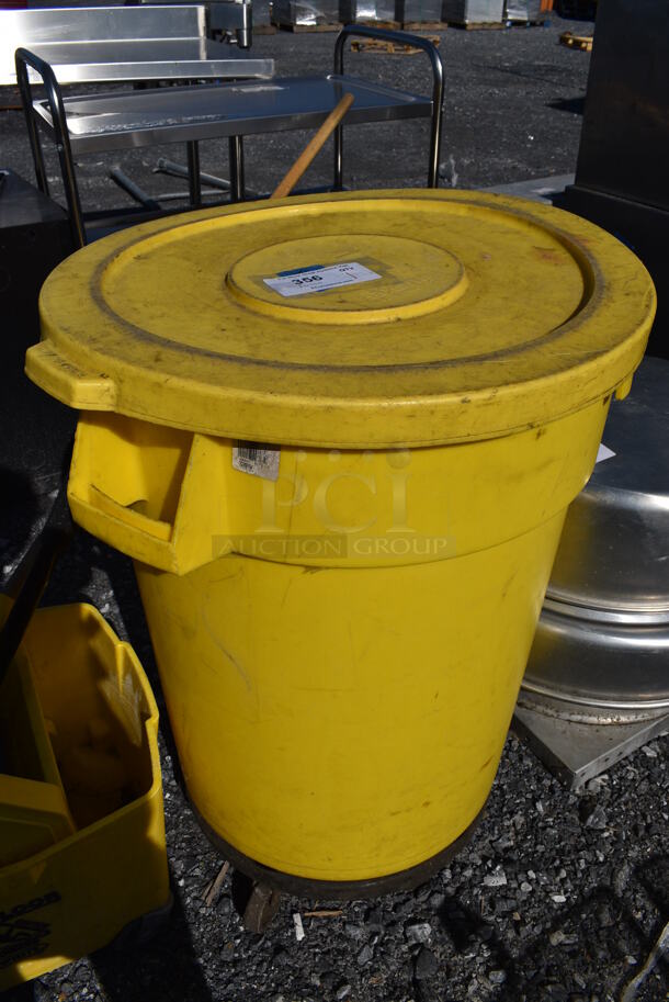 Continental Huskee Yellow Poly Trash Can w/ Lid on Dolly. 26x23x33