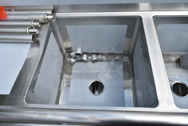 BRAND NEW SCRATCH AND DENT! Regency 600S21818224 86" 16 Gauge Stainless Steel Two Compartment Commercial Sink with Stainless Steel Legs, Cross Bracing, and 2 Drainboards - 18" x 18" x 14" Bowls - Image 6 of 9