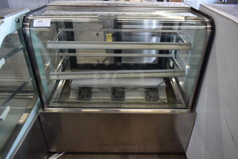 Stainless Steel Commercial Floor Style Deli Display Case Merchandiser. See Picture For Crack on Side Pane. Tested and Powers On But Does Not Get Cold