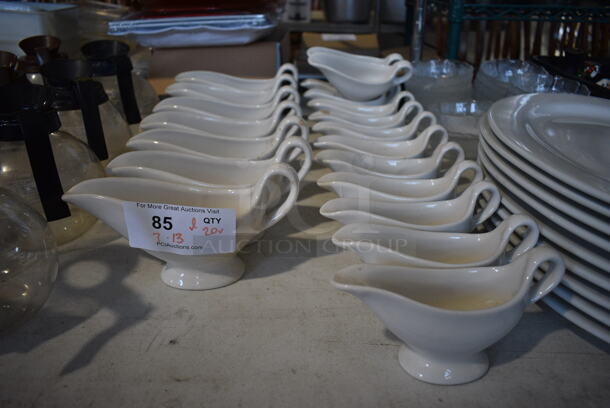 ALL ONE MONEY! Lot of 20 Various White Ceramic Gravy Boats. 7x2.5x4, 9x3.5x5 - Image 1 of 4