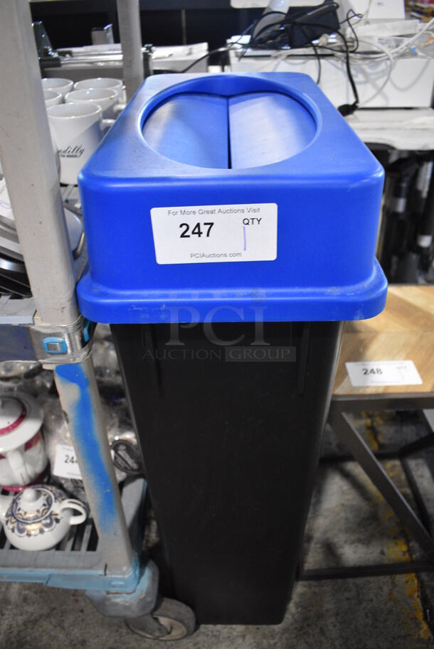 Black Poly Slim Jim Trash Can w/ Blue Lid. 11x20x34