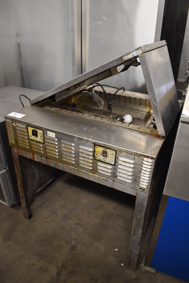 Duke Stainless Steel Commercial Dumping Station w/ Warming Strip. Missing 1 Bracket. 36x34x53. Tested and Powers On But Does Not Get Warm - Image 2 of 7