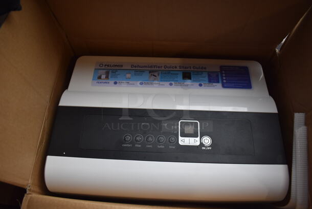 IN ORIGINAL BOX! Pelonis PAD20C1AWT ENERGY STAR 22 Pint Dehumidifier. 120 Volts, 1 Phase. 15x10.5x19 - Image 1 of 5