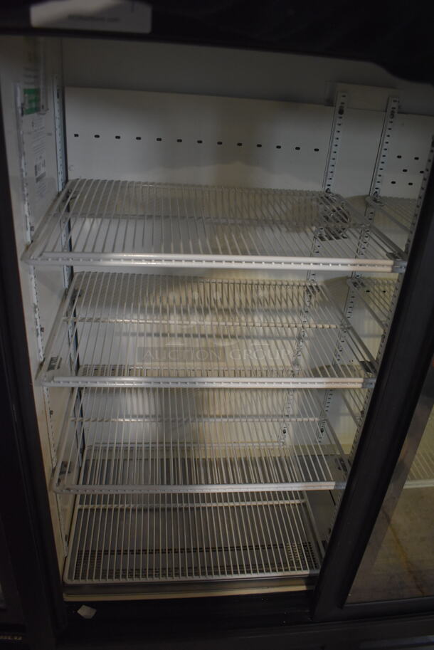 QBD CD4154SL Commercial Reach In Cooler in Black With Glass Sliding Doors and Polycoated Racks on Commercial Casters. 115V/1 Phase Tested And Working - Image 4 of 7