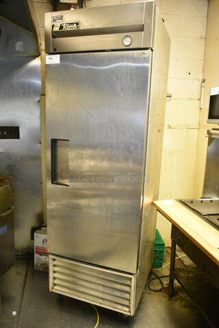 True T-23F Stainless Steel Commercial Single Door Reach In Freezer w/ Poly Coated Racks on Commercial Casters. 115 Volts, 1 Phase. This Unit Was In Working Condition When the Restaurant Closed. (kitchen)