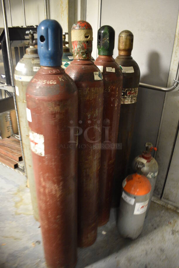 4 Metal Helium Tanks. 8x8x57. Buyer Must Pick Up - We Will Not Ship This Item. 4 Times Your Bid! (kitchen) - Image 1 of 6