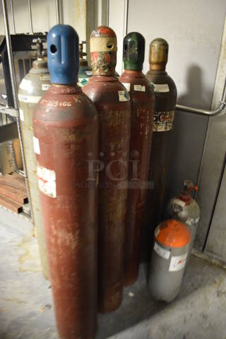 4 Metal Helium Tanks. 8x8x57. Buyer Must Pick Up - We Will Not Ship This Item. 4 Times Your Bid! (kitchen)