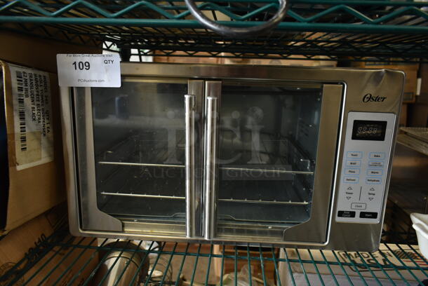 Oster TSSTTVFDDG Stainless Steel Countertop Toaster Oven. 120 Volts, 1 Phase. Tested and Working!