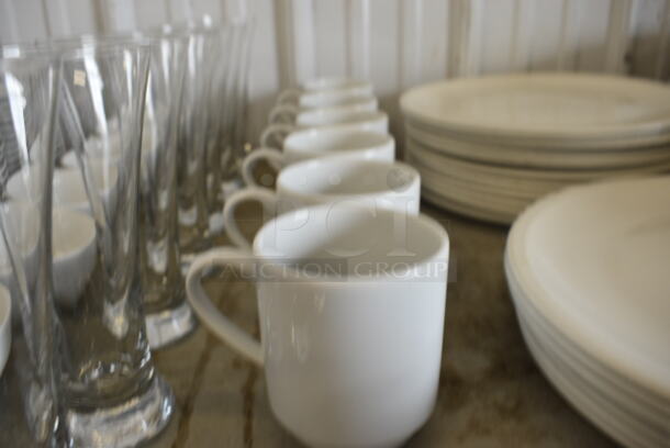 7 White Ceramic Mugs. 4.5x3.5x4. 7 Times Your Bid!
