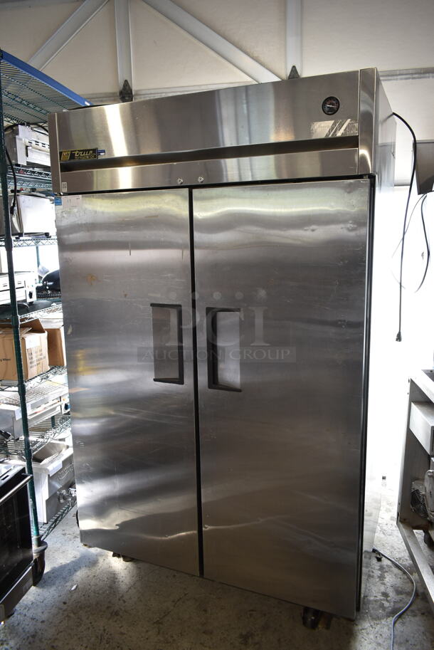2012 True TG2R-2S ENERGY STAR Stainless Steel Commercial 2 Door Reach In Cooler w/ Poly Coated Racks on Commercial Casters. 115 Volts, 1 Phase. Tested and Working! - Image 2 of 9