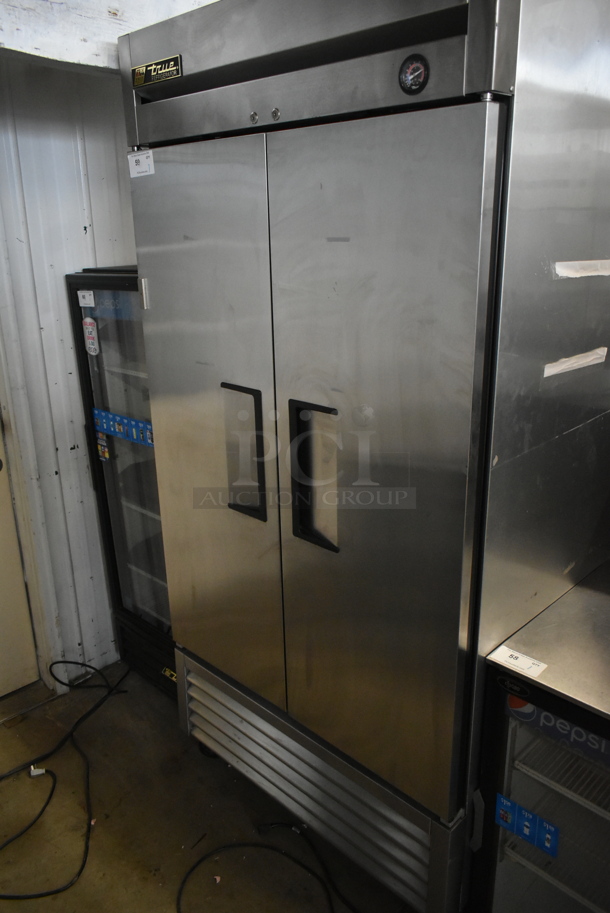 2015 True T-35 Stainless Steel Commercial 2 Door Reach In Cooler w/ Poly Coated Racks on Commercial Casters. 115 Volts, 1 Phase. Tested and Working!