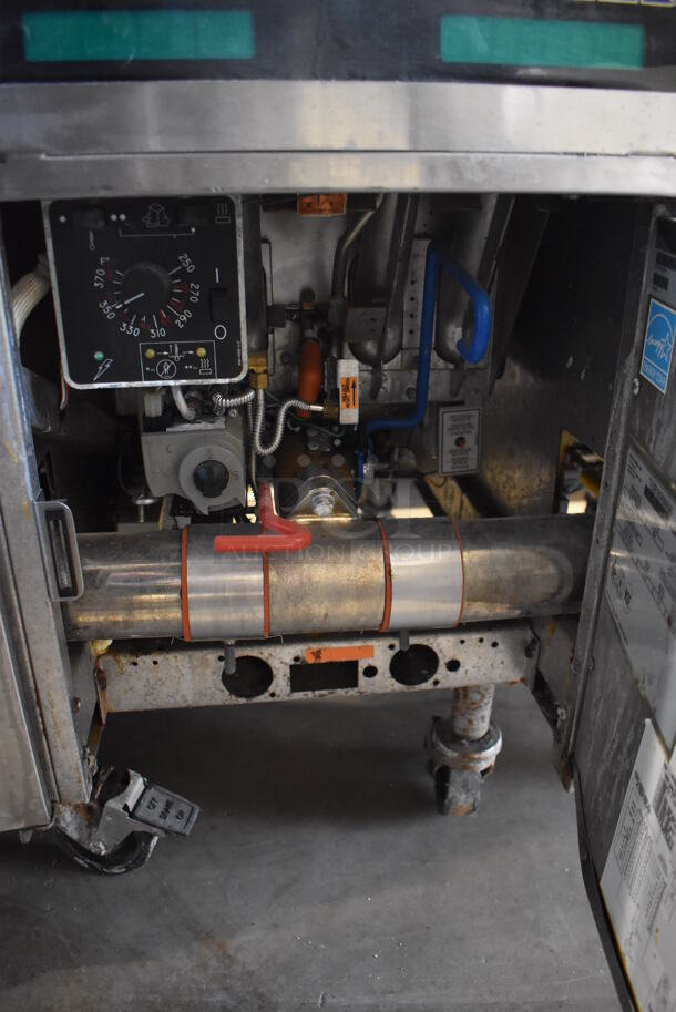 2014 Pitco Frialator Model SSH60 ENERGY STAR Stainless Steel Commercial 4 Bay Natural Gas Powered Deep Fat Fryer w/ 6 Metal Fry Baskets and Filtration System on Commercial Casters. 80,000 BTU. 62.5x35x49 - Image 10 of 12