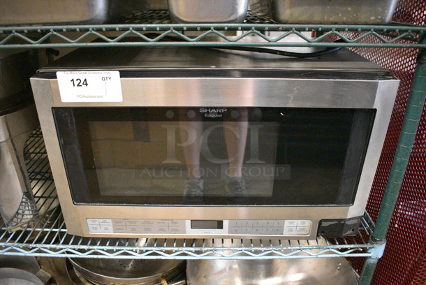 Sharp Model R-1214F Countertop Microwave Oven w/ Plate. 120 Volts, 1 Phase. 24x15.5x14.5