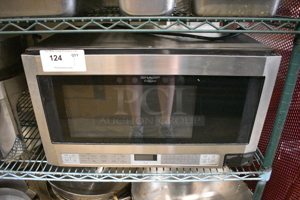 Sharp Model R-1214F Countertop Microwave Oven w/ Plate. 120 Volts, 1 Phase. 24x15.5x14.5 - Image 1 of 5