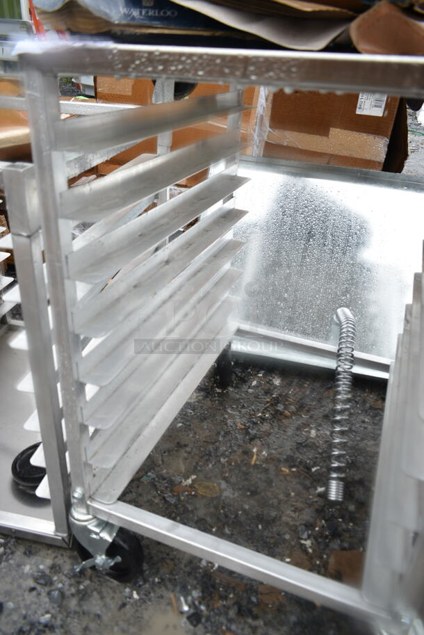 BRAND NEW SCRATCH AND DENT! Regency 600UPR8WTELS 8 Pan End Load Aluminum Undercounter Bun / Sheet Pan Rack with Stainless Steel Top and Side Channel - Image 5 of 7