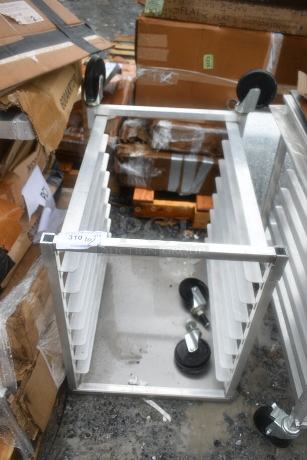 BRAND NEW SCRATCH AND DENT! Regency 600UPR8WTELS 8 Pan End Load Aluminum Undercounter Bun / Sheet Pan Rack with Stainless Steel Top. 2 Casters Need To Be Attached.  - Image 2 of 7