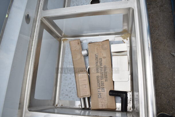 BRAND NEW SCRATCH AND DENT! Regency 600S22424224 98" 16 Gauge Stainless Steel Two Compartment Commercial Sink with Galvanized Steel Legs and 2 Drainboards - 24" x 24" x 14" Bowls.  - Image 6 of 9