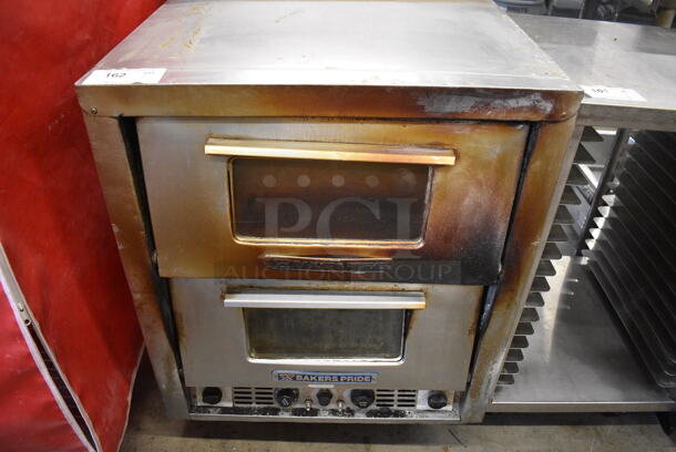 Baker's Pride Model P-44S Stainless Steel Commercial Electric Powered Double Deck Pizza Oven w/ 2 Cooking Stones and 2 Broken Cooking Stones on Commercial Casters. 115/208 Volts. 26.5x29x35