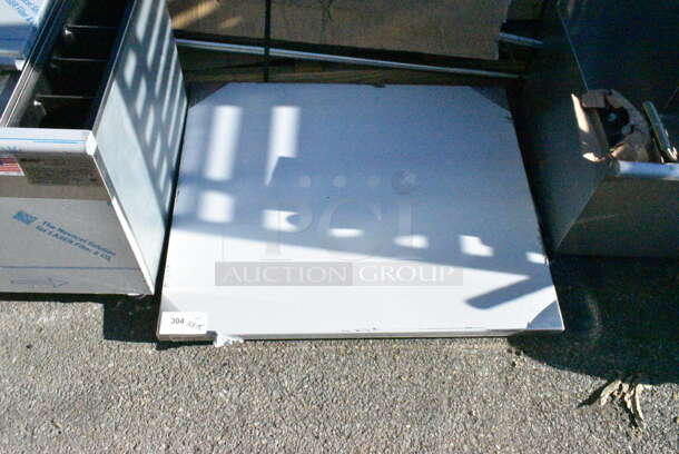 BRAND NEW SCRATCH AND DENT! Regency Spec Line Stainless Steel Table w/ Under Shelf and Legs - Image 2 of 6