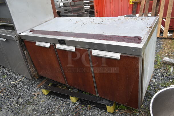 Randell Stainless Steel Commercial 3 Door Undercounter Cooler. Tested and Powers On But Does Not Get Cold