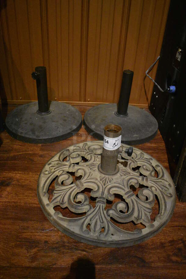 3 Various Patio Umbrella Bases. 21x21x12, 17x17x12. 3 Times Your Bid! (bar)