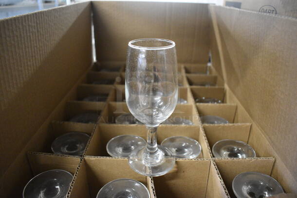 24 Wine Glasses. 2.5x2.5x6.25. 24 Times Your Bid!