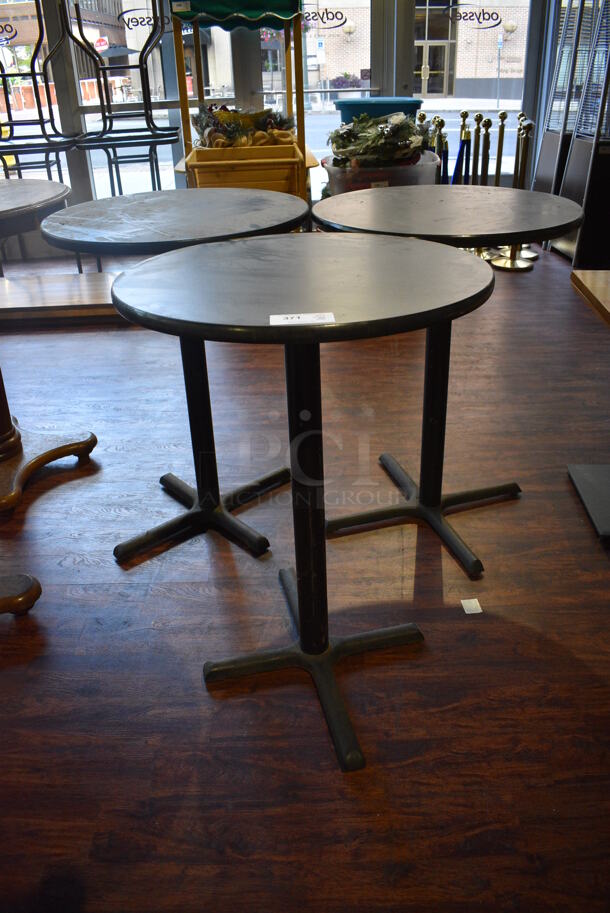 3 Black Round Bar Height Tables on Black Metal Table Base. 30x30x42. 3 Times Your Bid! (lounge) - Image 1 of 4