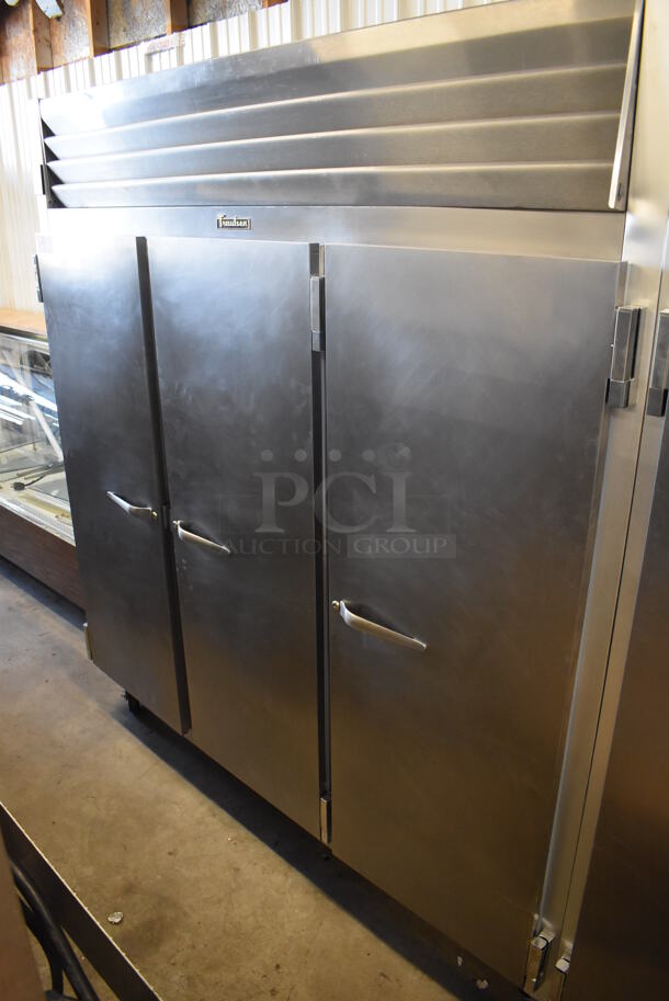 Traulsen G31010 ENERGY STAR Stainless Steel 3 Door Reach In Freezer on Commercial Casters. 115 Volts, 1 Phase. 76x34x83. Tested and Powers On But Temps at 28 Degrees