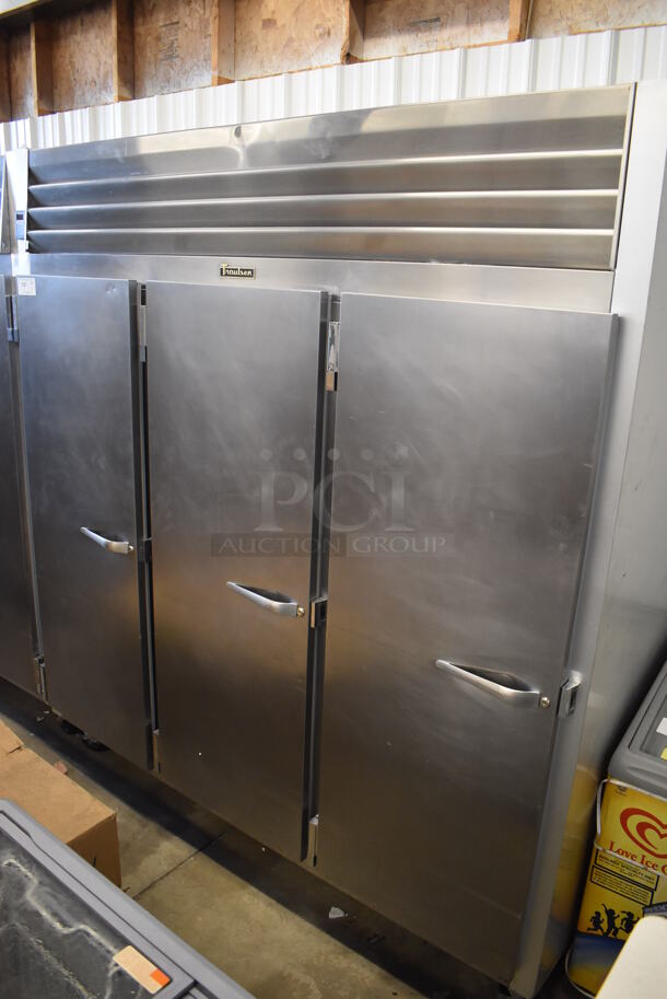 Traulsen G31013 ENERGY STAR Stainless Steel 3 Door Reach In Freezer on Commercial Casters. 115 Volts, 1 Phase. 76x34x83. Tested and Powers On But Temps at 30 Degrees