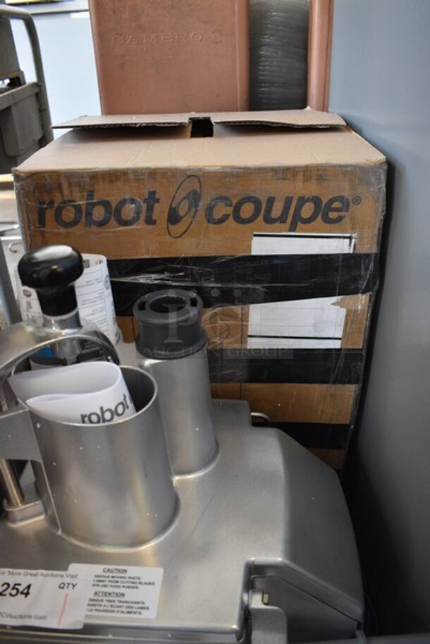 BRAND NEW IN BOX! Robot Coupe Model CL50 U Series E Metal Commercial Countertop Continuous Feed Food Processor w/ 2 Gray Poly Blade Holders, 28058 Grater Blade and 28064W Slicing Blade. 120 Volts, 1 Phase. 14x12x24. Tested and Working! - Image 11 of 11