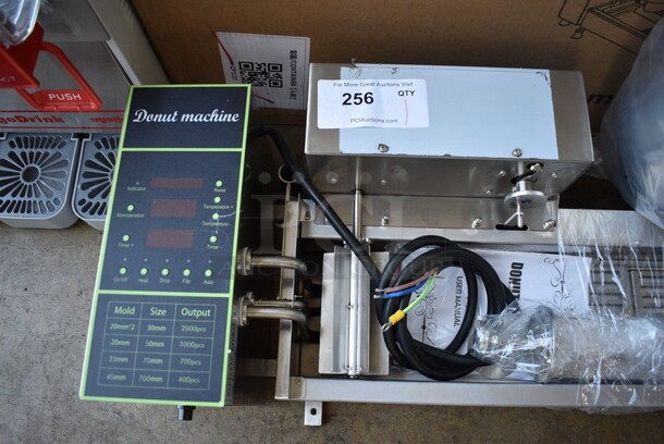 BRAND NEW IN BOX! Model T-101 Stainless Steel Commercial Countertop Electric Powered Automatic Donut Making Machine. 110 Volts. Stock Picture Used As Gallery. 39x19x24. - Image 2 of 11
