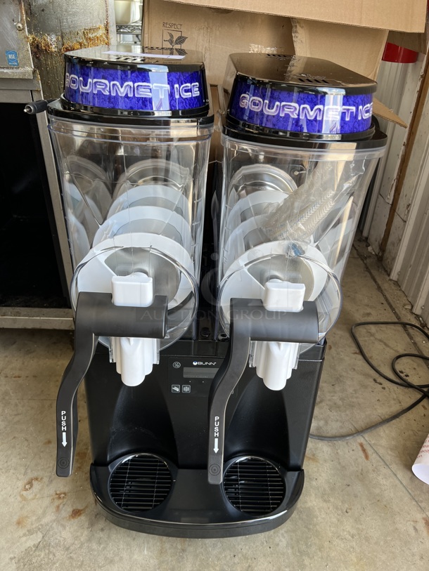 BRAND NEW IN BOX! 2022 Bunn Model ULTRA-2 Stainless Steel Commercial Countertop 2 Hopper Slushie Machine. 120 Volts, 1 Phase. 16x24x34