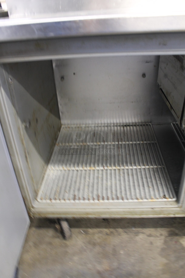 Randell Pizza Prep Table 8264NM w/ Poly Coated Racks on Commercial Casters. 115 Volt, 1 Phase. Tested and Powers On But Does Not Get Cold
 - Image 5 of 8
