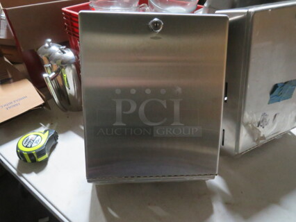 One NEW Stainless Steel Bobrick Paper Towel Dispenser.