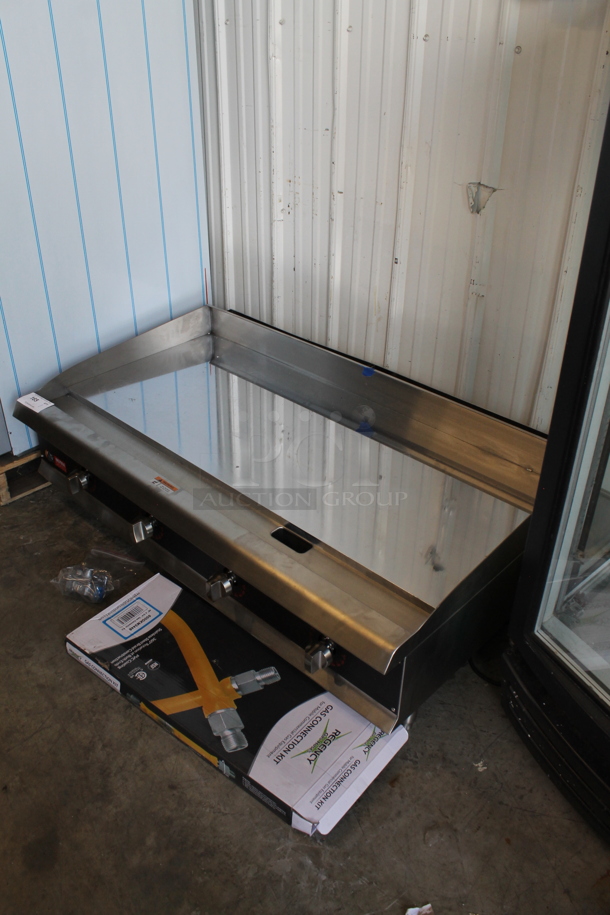 BRAND NEW SCRATCH AND DENT! Cooking Performance Group CPG 351GTUCPG48N Ultra Series Stainless Steel Commercial Countertop Chrome Top Chrome Top Flat Top Griddle w/ Regency Gas Hose Kit and Thermostatic Controls.  - Image 6 of 7