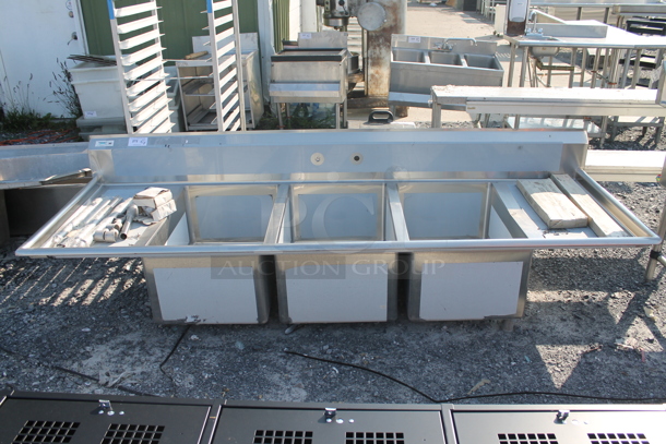 BRAND NEW SCRATCH AND DENT! Regency 600S32030220 Stainless Steel Commercial 3 Bay Sink w/ Dual Drain Boards. Bays 20x30. Drain Boards 18.5x32 - Image 1 of 8