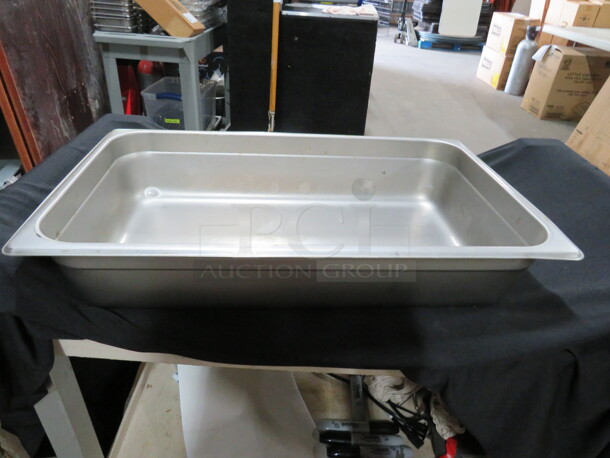 One Full Size 4 Inch Deep Hotel Pan.