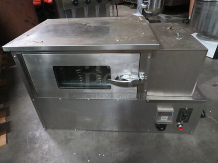 One Pizza Cone Oven. WORKING WHEN REMOVED.33X17X20