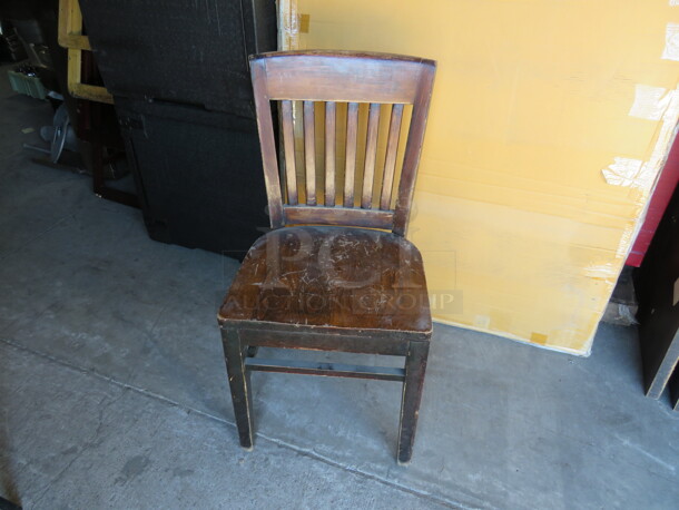 Dark Wooden Schoolhouse Chair. 3XBID.
