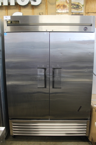 2013 True T-49F ENERGY STAR Stainless Steel Commercial 2 Door Reach In Freezer w/ Poly Coated Racks on Commercial Casters. 115 Volts, 1 Phase. Tested and Working!