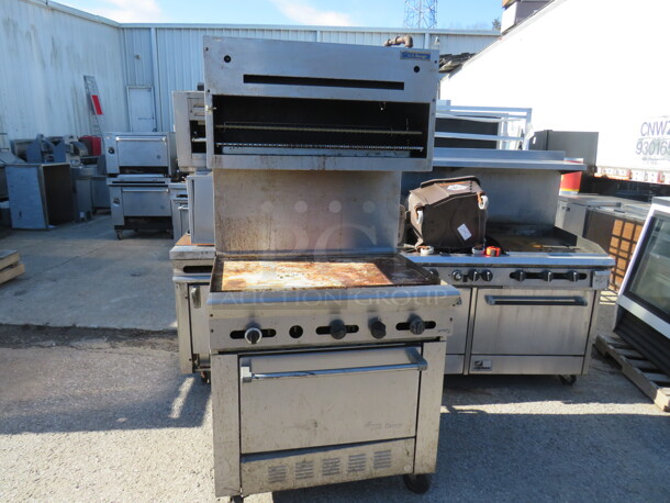 One US Range Natural Gas Flat Top Griddle Range With Salamander On Casters. 36X32X74